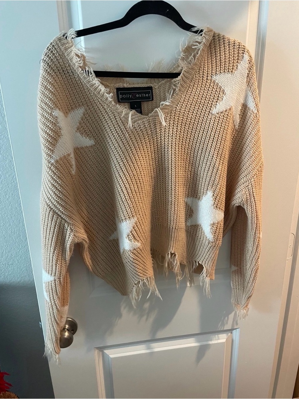 Women’s distressed knit cropped sweater